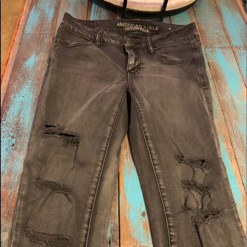 Black jeans with holes